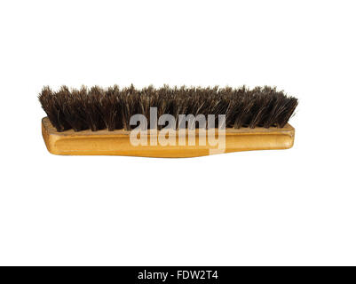Old clothes (or shoe) brush with wooden handle isolated on the white background Stock Photo