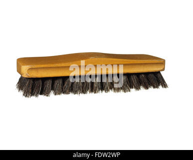 Old clothes (or shoe) brush with wooden handle isolated on the white background Stock Photo
