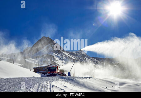 Red ratrack vehicle for snow preparation at ski resort in Pyrenees, Europe Stock Photo