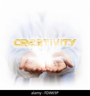 Word creativity and human hands. Concept illustration. Stock Photo