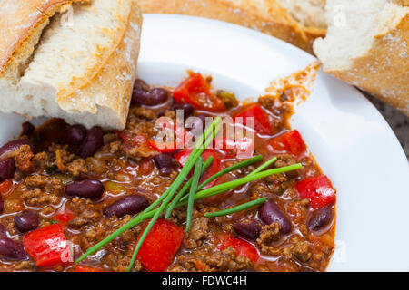 hot mexican chili con carne with bread Stock Photo