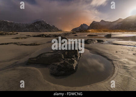 Beautiful moonlit Skagsanden beach in Flakstad Lofoten Islands, Norway Stock Photo