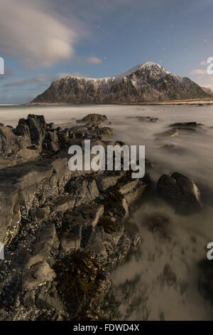 Beautiful moonlit Skagsanden beach in Flakstad Lofoten Islands, Norway Stock Photo