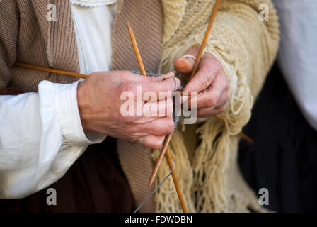 Close up of senior woman hands knitting Stock Photo