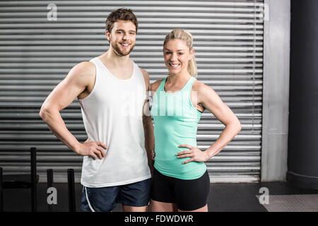 Fit couple posing together Stock Photo