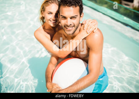 Happy couple with beach ball Stock Photo