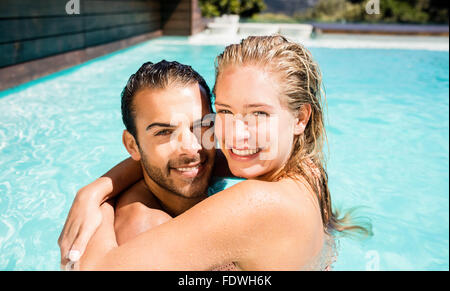 romantic couple embracing in swimming pool Stock Photo - Alamy