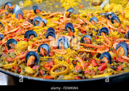 SEAFOOD PAELLA IN AN OUTDOOR RESTAURANT IN ALICANTE SPAIN Stock Photo