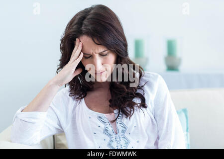 Pregnant woman with headache Stock Photo