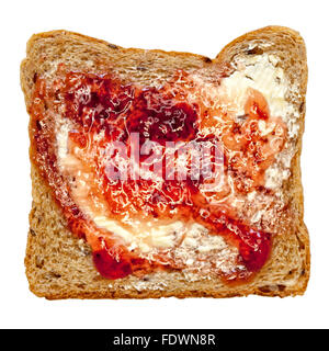 Close up view o whole wheat toasted bread with butter and strawberry jam isolated on white background  Model Release: No.  Property Release: No. Stock Photo