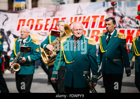 Gomel, Belarus - May 9, 2015: People from city Brass Band Orchestra participating in the parade dedicated to the Victory Day - t Stock Photo