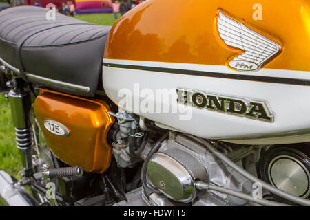 Close up of the side of a gold, 1971 Honda cb175 motorcycle Stock Photo