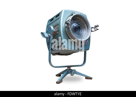 Studio spotlight lighting equipment with stand. Isolated on white background, clipping path included. Electrical source of constant light, halogen bulb. Stock Photo