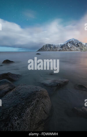 Beautiful moonlit Skagsanden beach in Flakstad Lofoten Islands, Norway Stock Photo