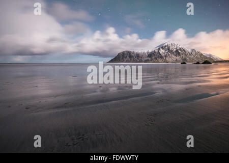 Beautiful moonlit Skagsanden beach in Flakstad Lofoten Islands, Norway Stock Photo