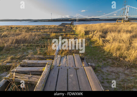 Old wooden pier which was for the Aust ferry that crossed River Severn to Beachley. United Kingdom. Stock Photo