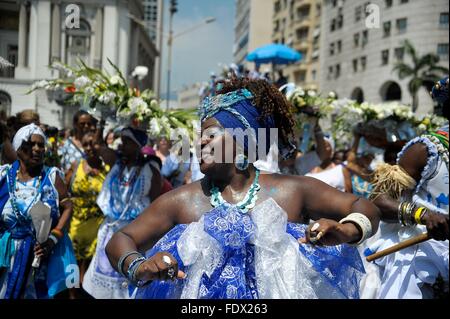 Rio de Janeiro, Brazil. 2nd February, 2016. Afro-Brazilian revelers dance through the streets during the pre-Carnaval Day of Yemanja parade February 2, 2016 in Rio de Janeiro, Brazil. The recent outbreak of Zika virus didn't stop Brazilians and tourists for coming out in the thousands to join the party. Stock Photo