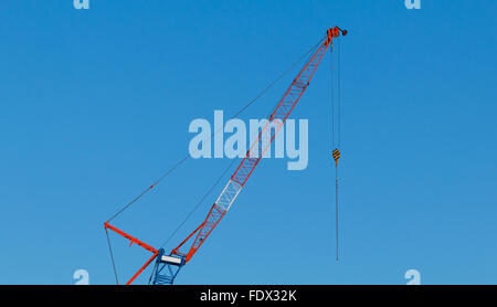 Construction crane against blue sky Stock Photo