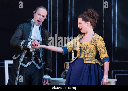 Leeds, UK. 1st February 2016. Opera North performing ‘Cosi Fan Tutte  by Mozart, directed by Tim Alberry. L to R, William Dazely as Don Alfonso, Ellie Laugherne as Despina,  Credit:  Jeremy Abrahams / Alamy Live News Stock Photo