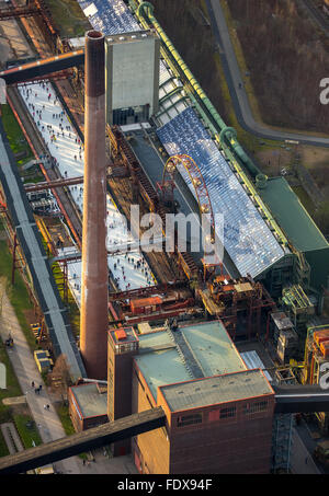 Coking plant, Zeche Zollverein, ice rink, ice skaters, industrial scene, Essen, Ruhr district, North Rhine-Westphalia, Germany Stock Photo