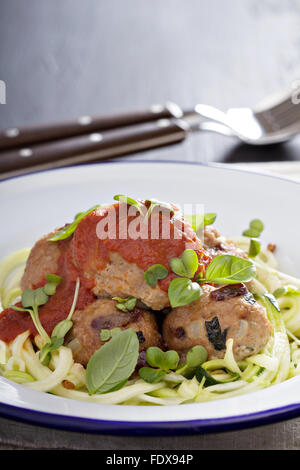 Turkey meatballs with zucchini noodles and tomato sauce Stock Photo