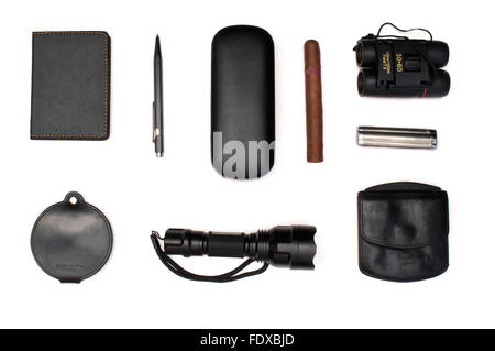 Isolated cigar, notebook, flashlight, wallet and pen over white Stock Photo