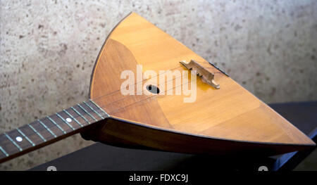 The balalaika is a Russian stringed musical instrument Stock Photo