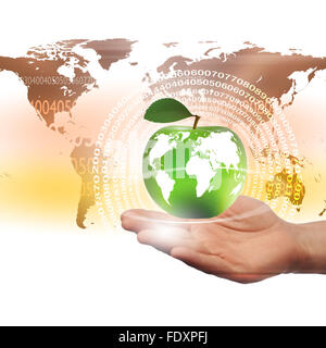 hands holding an apple representing our planet earth Stock Photo