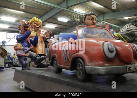 Mainz, Germany. 02nd Feb, 2016. The VW emission scandal is depicted in papier-mache figures, showing a car that blows smoke at a family standing behind it. The floats that will take part in the 2016 Rose Monday parade in Mainz were presented to the press. The Rose Monday parade in Mainz is the highlight of the street carnival in Mainz. Credit:  Michael Debets/Pacific Press/Alamy Live News Stock Photo