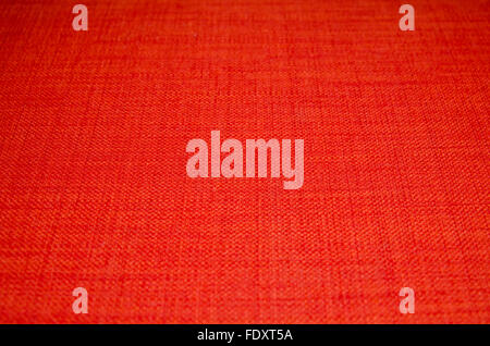 Upholstery detail angled view of orange chair Stock Photo