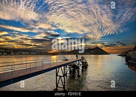 Sunset  in Donostia - San Sebastian, Basque Country, Spain. In the background to the right, Monte Igueldo. Stock Photo