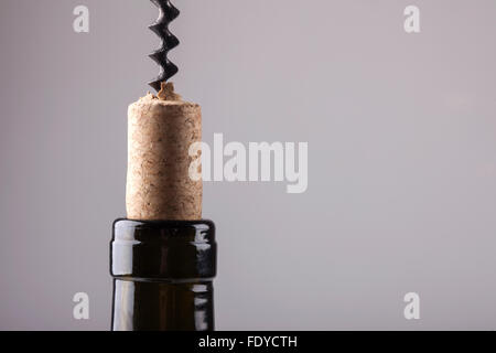 neck of a wine bottle vintage cork and corkscrew