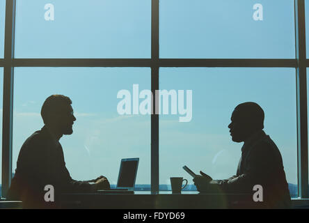 Two managers networking at meeting in office Stock Photo