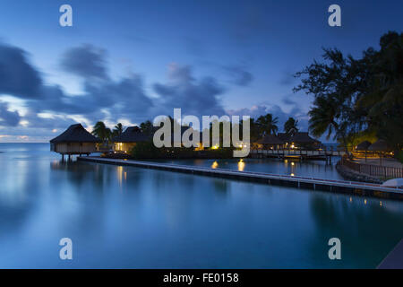Overwater bungalows of Intercontinental Mo'orea Resort, Hauru Point, Moorea, Society Islands, French Polynesia Stock Photo