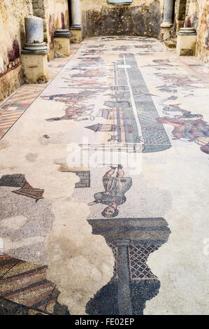 Roman mosaics of horsemen in Villa Romana del Casale, Piazza Armerina, Sicily, Italy Stock Photo