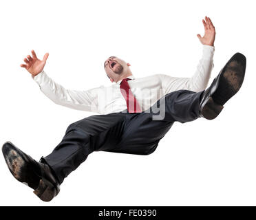 Young businessman falling down in free fall. Isolated on white