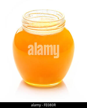 Pot of honey on white background Stock Photo