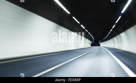 abstract highway tunnel blured background with lights. Stock Photo