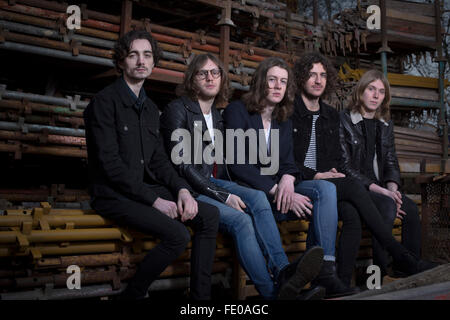 Stockport band Blossoms, pictured in a scaffolders' yard in the town. The guitar pop band have come fourth on the BBC Sound of 2016 list, which highlights the hottest new acts for the new year. The five members, who were all born in the same Stockport hospital, formed in 2013 and have honed their sound by rehearsing in their bassist's granddad's scaffolding yard take their name from a local pub. Stock Photo