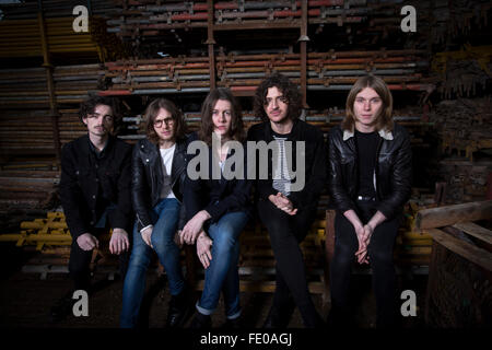 Stockport band Blossoms, pictured in a scaffolders' yard in the town. The guitar pop band have come fourth on the BBC Sound of 2016 list, which highlights the hottest new acts for the new year. The five members, who were all born in the same Stockport hospital, formed in 2013 and have honed their sound by rehearsing in their bassist's granddad's scaffolding yard take their name from a local pub. Stock Photo