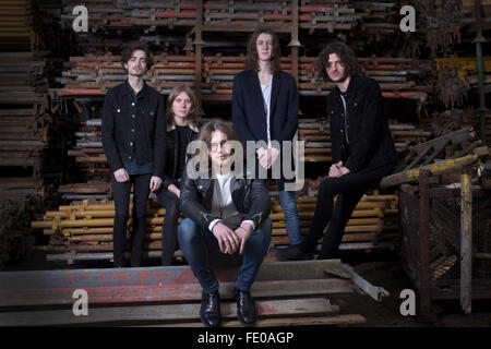 Stockport band Blossoms, pictured in a scaffolders' yard in the town. The guitar pop band have come fourth on the BBC Sound of 2016 list, which highlights the hottest new acts for the new year. The five members, who were all born in the same Stockport hospital, formed in 2013 and have honed their sound by rehearsing in their bassist's granddad's scaffolding yard take their name from a local pub. Stock Photo