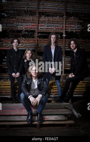 Stockport band Blossoms, pictured in a scaffolders' yard in the town. The guitar pop band have come fourth on the BBC Sound of 2016 list, which highlights the hottest new acts for the new year. The five members, who were all born in the same Stockport hospital, formed in 2013 and have honed their sound by rehearsing in their bassist's granddad's scaffolding yard take their name from a local pub. Stock Photo