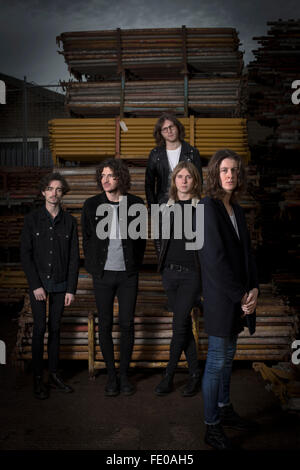 Stockport band Blossoms, pictured in a scaffolders' yard in the town. The guitar pop band have come fourth on the BBC Sound of 2016 list, which highlights the hottest new acts for the new year. The five members, who were all born in the same Stockport hospital, formed in 2013 and have honed their sound by rehearsing in their bassist's granddad's scaffolding yard take their name from a local pub. Stock Photo