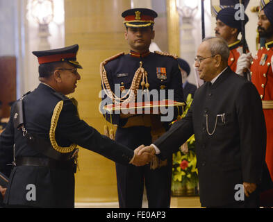 New Delhi, India. 3rd Feb, 2016. Indian President Pranab Mukherjee (R, front) confers the Honorary Rank of General of the Indian Army on General Rajendra Chhetri, Chief of the Army Staff of Nepalese Army, in New Delhi, India, Feb. 3, 2016. Rajendra is conferred Wednesday for his commendable military prowess and immeasurable contribution to fostering Nepal's long and friendly association with India. © Stringer/Xinhua/Alamy Live News Stock Photo
