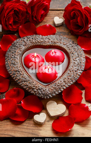 Rose petals floating in water Stock Photo - Alamy