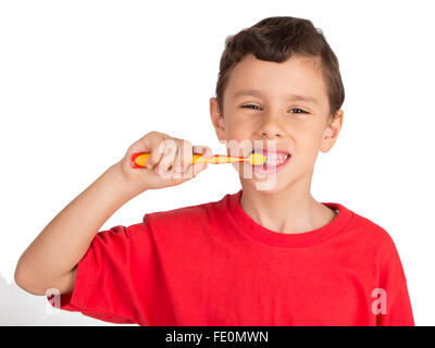 Young Boy brushing his teeth Stock Photo