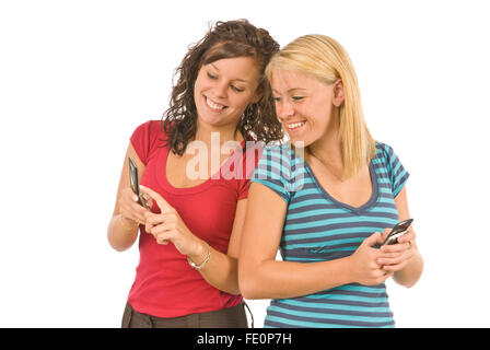Two Female Teenagers Sharing Text Messages Stock Photo