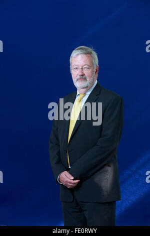 Civil servant, professor and company director, Jim Gallagher, appearing