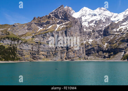 View of Oeschinensee (Oeschinen lake) with Bluemlisalp and Frundenhorn of Swiss alps on Bernese Oberland Stock Photo