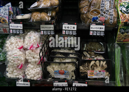 mushrooms for sale at a local market in Japan